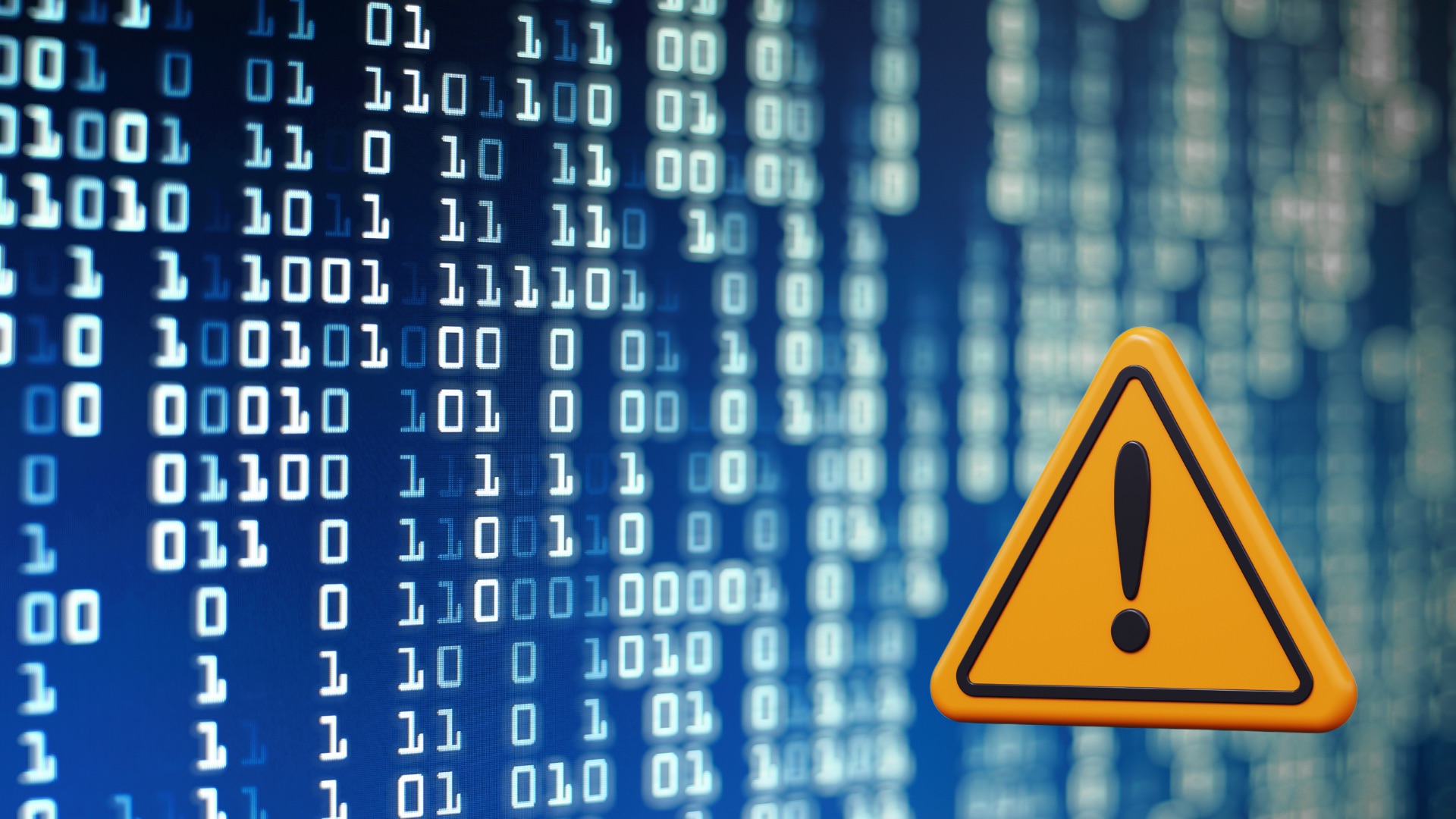 Ein gelbes Dreieck mit einem schwarzen Ausrufezeichen. Im Hintergrund sind Einsen und Nullen in Weiß auf blauem Hintergrund.